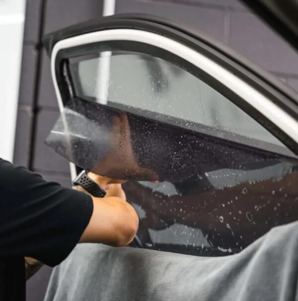 Applying-Ceramic-Tinting-on-Luxury-Car-Widnow